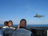 LSOs and VAQ-140 Patriots EA-6B Prowler AG-502 at the ramp