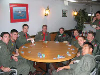 Poker tournament. Seated, left to right: Spock, DIM, Mouth, Fitz, Snuffy, Stooli, Axle, Buttch, and CLAP. Standing: Bobo. Also pictured: Lefty’s big stack of chips