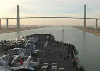USS George Washington approaching the Mubarak Peace Bridge during southbound Suez Canal transit