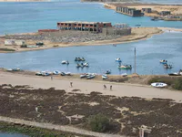 Small boats along the Suez Canal