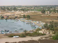 Small boats along the Suez Canal