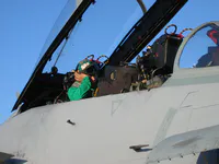 Red Ripper Aviation Electronics Technician working on the RIO station