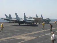 AG-103 (161421) with AIM-54C Phoenix on belly, AIM-54C Phoenix on left shoulder station, LANTIRN, on Catapult 3, Knighthawk AG-305 on Catapult 4, and RIPPER 201 (162912) with AIM-54C Phoenix in the belly, LANTIRN