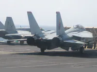 Knighthawk AG-305 on Catapult 4, and RIPPER 201 (162912) with AIM-54C Phoenix in the belly, LANTIRN