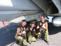 RIPPER 202 (161418) with 2x AIM-54C Phoenix missles on the belly with VF-11 Plane Captains