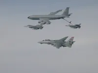 RIPPER 201 (162912) waiting patiently for 2x F-16 Falcons with 2x AIM-120 AAMRAMs on wingtip stations and a 500 lb GBU-38 JDAM (Joint Direct Attack Munition).  KC-135 Registration / Serial Number: 63-8884 (a Boeing KC-135R Stratotanker), 92nd Air Refueling Wing, operating out of Fairchild Air Force Base, Washington., configured with centerline boom for Air Force aircraft and MPRS (Multi-point Refueling System) and a Wing Air Refueling Pod (WARP) on left wing.
