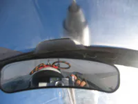 Dingle and Lefty’s camera reflected in a mirror aboard RIPPER 204.