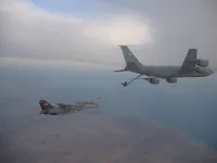 RIPPER 200 (163227) heading to plug on the KC-135, GBU-16s on belly.