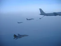 RIPPER 200 (163227) detached from the KC-135, GBU-16s on belly, AG-100, AG-114 in background.