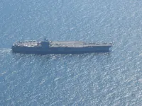 USS George Washington (CVN-73) starboard side view from low holding