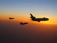 RIPPER 200 (163227) with 2x GBU-16s plugging on KC-10A Extender tanker serial 79-1713 with F/A-18C waiting