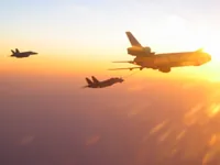 RIPPER 200 (163227) with 2x GBU-16s plugging on KC-10A Extender tanker serial 79-1713 with F/A-18C waiting