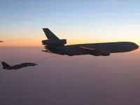 RIPPER 200 (163227) with 2x GBU-16s plugging on KC-10A Extender tanker serial 79-1713 with F/A-18C waiting