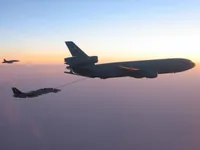 RIPPER 200 (163227) with 2x GBU-16s plugging on KC-10A Extender tanker serial 79-1713 with F/A-18C waiting