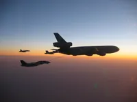 RIPPER 200 (163227) with 2x GBU-16s plugging on KC-10A Extender tanker serial 79-1713 with 2x F/A-18C waiting