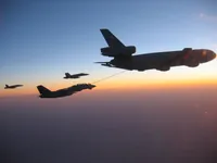 RIPPER 200 (163227) with 2x GBU-16s plugging on KC-10A Extender tanker serial 79-1713 with 2x F/A-18C waiting