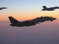 RIPPER 200 (163227) with 2x GBU-16s plugging on KC-10A Extender tanker serial 79-1713 with 2x F/A-18C waiting