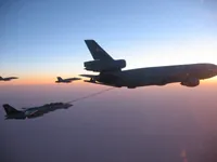 RIPPER 200 (163227) with 2x GBU-16s plugging on KC-10A Extender tanker serial 79-1713 with 2x F/A-18C waiting