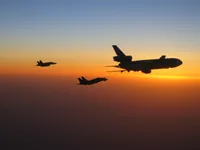 RIPPER 200 (163227) with 2x GBU-16s plugging on KC-10A Extender tanker serial 79-1713 with F/A-18C waiting