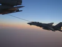 RIPPER 201 (162912) with 2x GBU-16s plugging on KC-10A Extender tanker serial 79-1713