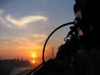 Lefty shooting the sunset over his shoulder on CVN-73