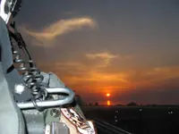 Lefty shooting the sunset over his shoulder on CVN-73
