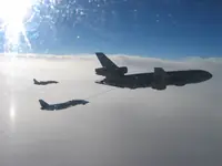 RIPPER 207 (161437) with 2x GBU-16s and LANTIRN plugged on USAF KC-10A Extender, serial 86-0036, AG-100 joined on port side with 2x GBU-16s