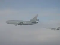 USAF KC-10A Extender, serial 86-0036, AG-100 preparing to plug with 2x GBU-16s