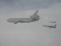 USAF KC-10A Extender, serial 86-0036, AG-105 plugged with 2x GBU-16s, AG-100 waiting on starboard side with 2x GBU-16s