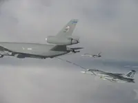 USAF KC-10A Extender, serial 86-0036, AG-105 plugged with 2x GBU-16s, AG-100 waiting on starboard side with 2x GBU-16s