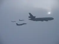 RIPPER 207 (161437) with 2x GBU-16s and LANTIRN plugged on USAF KC-10A Extender, serial 86-0036, AG-100 and AG-105 joined on port side with 2x GBU-16s