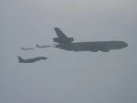 RIPPER 207 (161437) with 2x GBU-16s and LANTIRN plugged on USAF KC-10A Extender, serial 86-0036, AG-100 and AG-105 joined on port side with 2x GBU-16s.