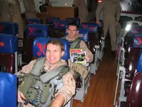 Lefty Lawrence and Boards Hatcher stand the Alert 15 in the VF-11 Red Rippers Ready Room