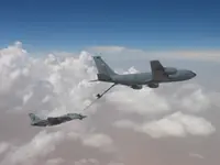 RIPPER 207 (161437) with 2x GBU-16s and LANTIRN plugged on USAF KC-135T Stratotanker — serial 59-1504 — Fairchild markings