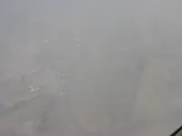 Dense urban neighborhoods and industrial/commercial areas on the eastern side of Fallujah